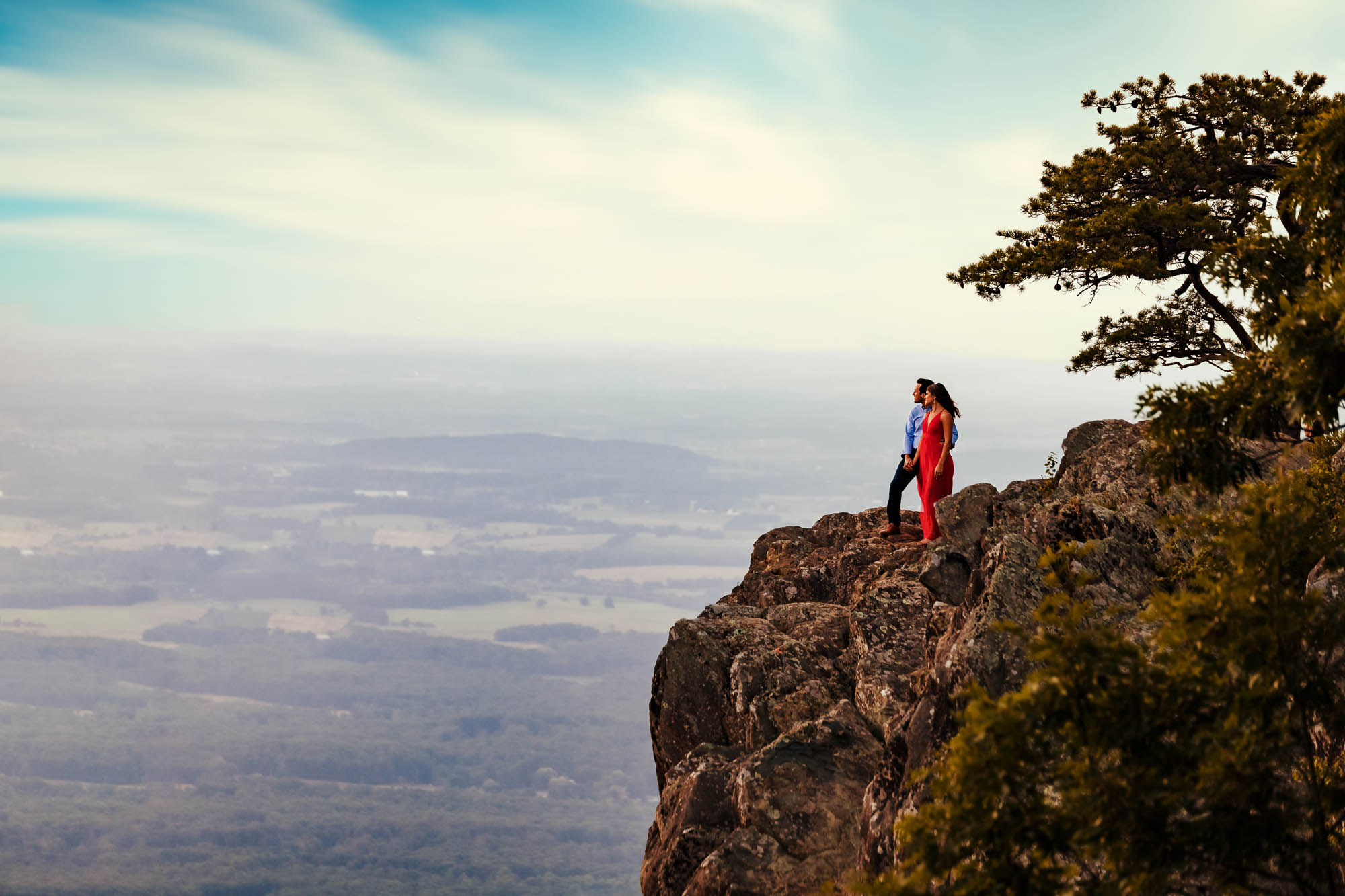 Couple standing on mountain overlook across the Shenandoah Valley